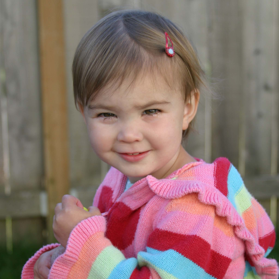Jamie Hannah in a pink shirt with a flower on it.